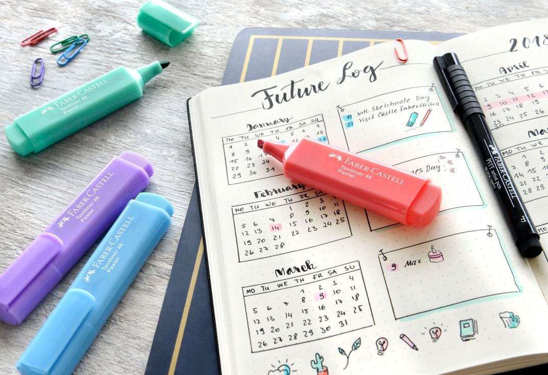 Bullet journal "calendar" and textmarkers in different colours.